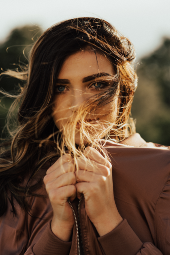 A woman after visiting the hairdressers in Barnstaple enjoying the wind