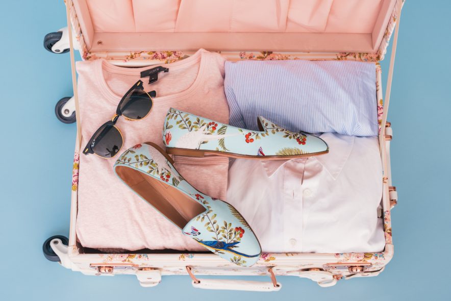 A suitcase packed for a holiday